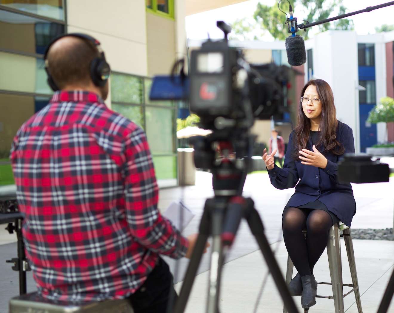 David interviewing a subject for a program video.